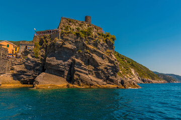Fototapeta na wymiar A view towards the castle hill in Vernazza, Italy in the summertime