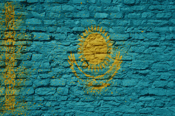 painted big national flag of kazakhstan on a massive old brick wall