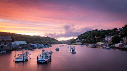 Fototapeta premium Red Sunset over Looe harbour, cornwall, South England