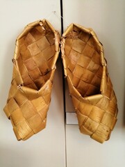 Vintage russian shoes boots and bast shoes made of brick bark