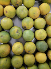 Fresh orange fruit sold in the market