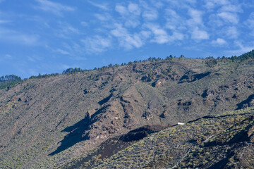 Lava mountains under a blue sky