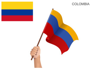 Flag of the State of Colombia hoisted with a stick held by hand to inflame the spirit of statehood