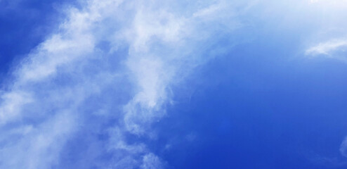 Naklejka na ściany i meble blue sky with tiny clouds