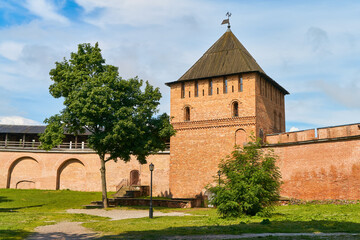 Detinets or Novgorod Kremlin red brick fortress walls. Towers of fortress in Novgorod Kremlin in summer day in Veliky Novgorod, Russia. Travel concept