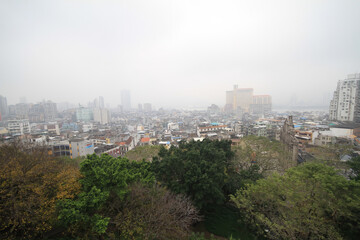 Fototapeta na wymiar High angle foggy view of the Macao cityscape