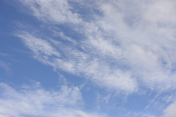 Blue sky and clouds, can be used as background.