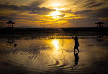Fototapeta premium Traditional Fisherman at Sunrise