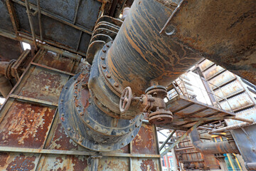 Unused and abandoned metal pipes in factories