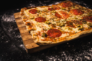 pizza on a wooden table
