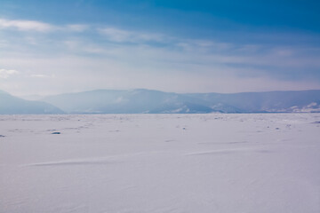View on mountains and blue sky above clouds