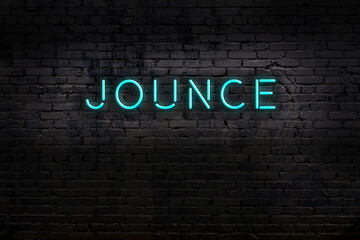 Night view of neon sign on brick wall with inscription jounce - obrazy, fototapety, plakaty