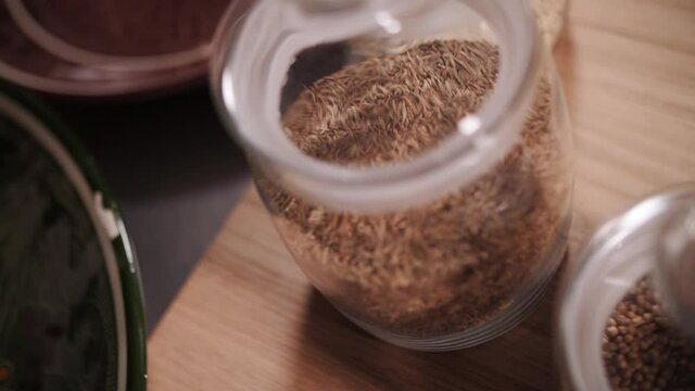 spices in glass jars in the kitchen