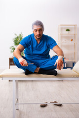 Fototapeta premium Young male doctor surgeon in fatal negligence concept