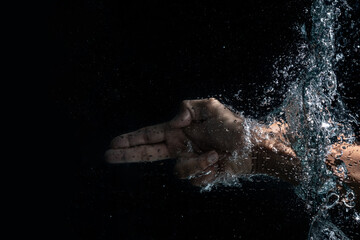 Obraz na płótnie Canvas Water splash in hands