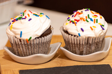 cupcake with icing and sprinkles sweet