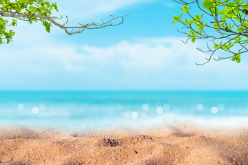 Tropical nature clean beach and white sand in summer with sun light blue sky and bokeh background.