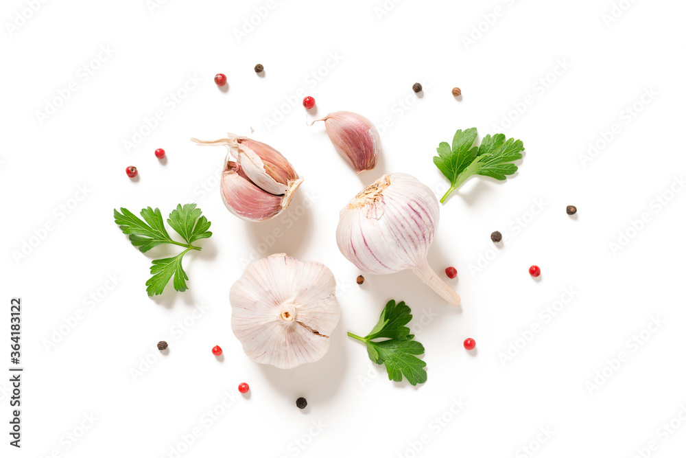 Wall mural garlic with parsley and peppercorn isolated on white background. top view.