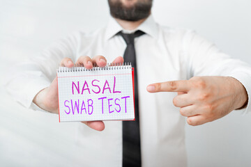 Writing note showing Nasal Swab Test. Business concept for diagnosing an upper respiratory tract infection through nasal secretion Model displaying different empty color notepad mock-up for writing