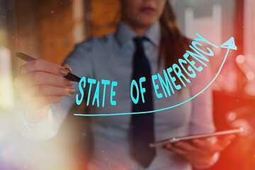 Text sign showing State Of Emergency. Business photo showcasing acknowledging an extreme condition affecting at a national level digital arrowhead curve rising upward denoting growth development