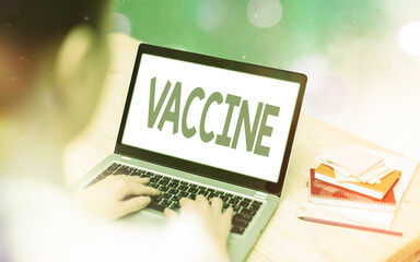 Conceptual hand writing showing Vaccine. Concept meaning preparation of killed microorganisms or...