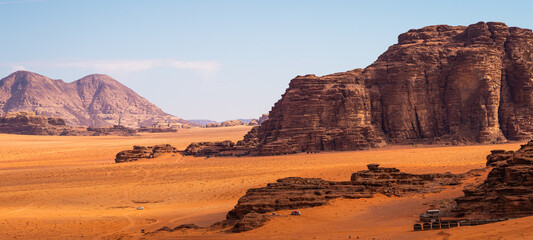 Fototapeta na wymiar Mountains and red desert in Wadi Rum, famous desert in Jordan, Arab. Panoramic banner portion