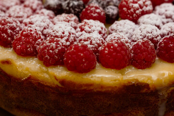 Homemade Cheesecake with Fresh Raspberries and Currants - Healthy Organic Summer Dessert Cheesecake Pie. Vanilla Cheese Cake with Wild Berry