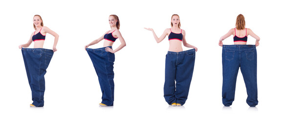 Fototapeta premium Woman with large jeans in dieting concept