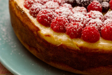 Homemade Cheesecake with Fresh Raspberries and Currants - Healthy Organic Summer Dessert Cheesecake Pie. Vanilla Cheese Cake with Wild Berry