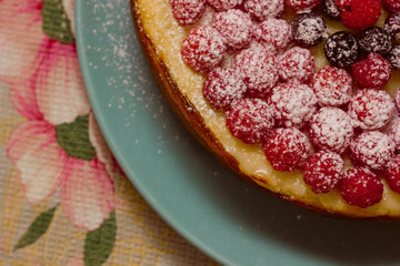 Homemade Cheesecake with Fresh Raspberries and Currants - Healthy Organic Summer Dessert Cheesecake Pie. Vanilla Cheese Cake with Wild Berry