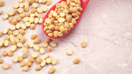 Black Chickpeas or Kala Chana with chana dal pulse isolated on wooden Background.