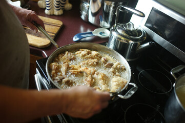 chef preparing fried chicken