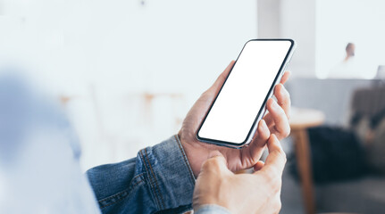 cell phone mockup image blank white screen.woman hand holding texting using mobile on desk at coffee shop.background empty space for advertise.work people contact marketing business,technology