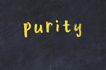Black chalkboard with inscription purity on in