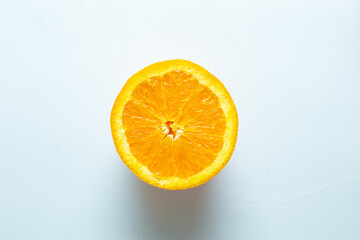 Sliced fresh orange fruit on white background