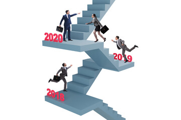 Businessman climbing stairs on yearly basis
