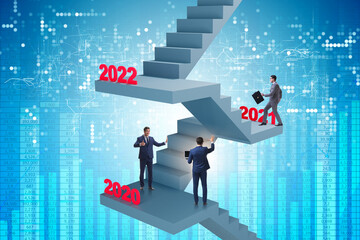 Businessman climbing stairs on yearly basis