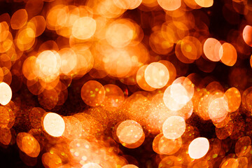 Abstract glowing gold particles background.