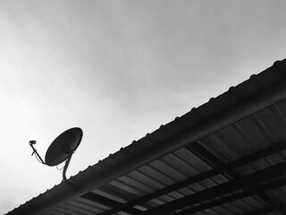 B&W, Satellite dish on the roof