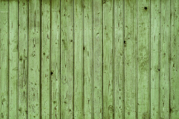 Fototapeta premium Old shabby and cracked plank painted fence