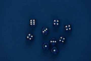 Dice on a classic blue background. Luck, gaming addiction