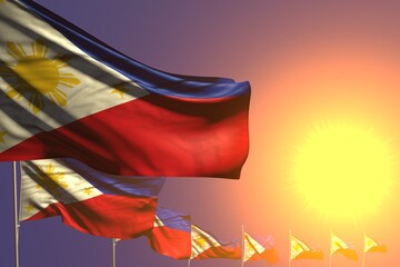 wonderful any occasion flag 3d illustration. - many Philippines flags placed diagonal on sunset with space for your content