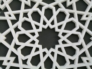 Beautiful modern Arabesque pattern/design originating from ancient Islamic civilization in the Middle East. The motif has linear interlacing line elements, resulting in repetitive geometric forms.