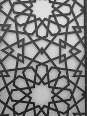 Beautiful modern Arabesque pattern/design originating from ancient Islamic civilization in the Middle East. The motif has linear interlacing line elements, resulting in repetitive geometric forms.