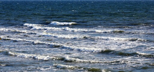 Waves chrashing the  rocks on the beach