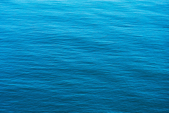 Blue sea water surface background, aerial view