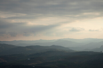 Foggy and different kind of light on the mountains