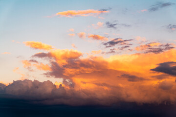 clouds in the sky while the golden hour