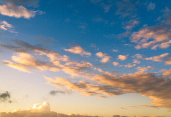 clouds in the sky while the golden hour