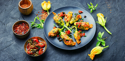 Fried zucchini flowers with filling.